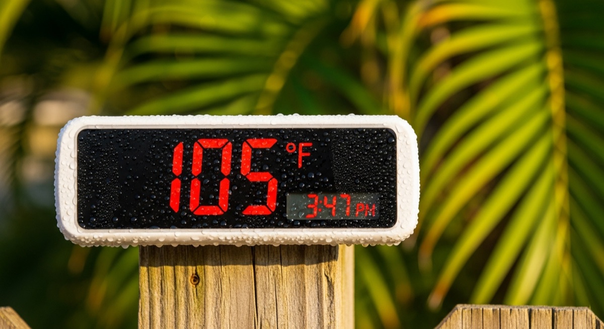 Heat index thermometer reading 105 degrees during Orlando summer afternoon humidity