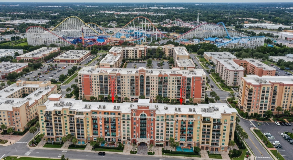 I-Drive tourist corridor real estate condo buildings with theme park district backdrop